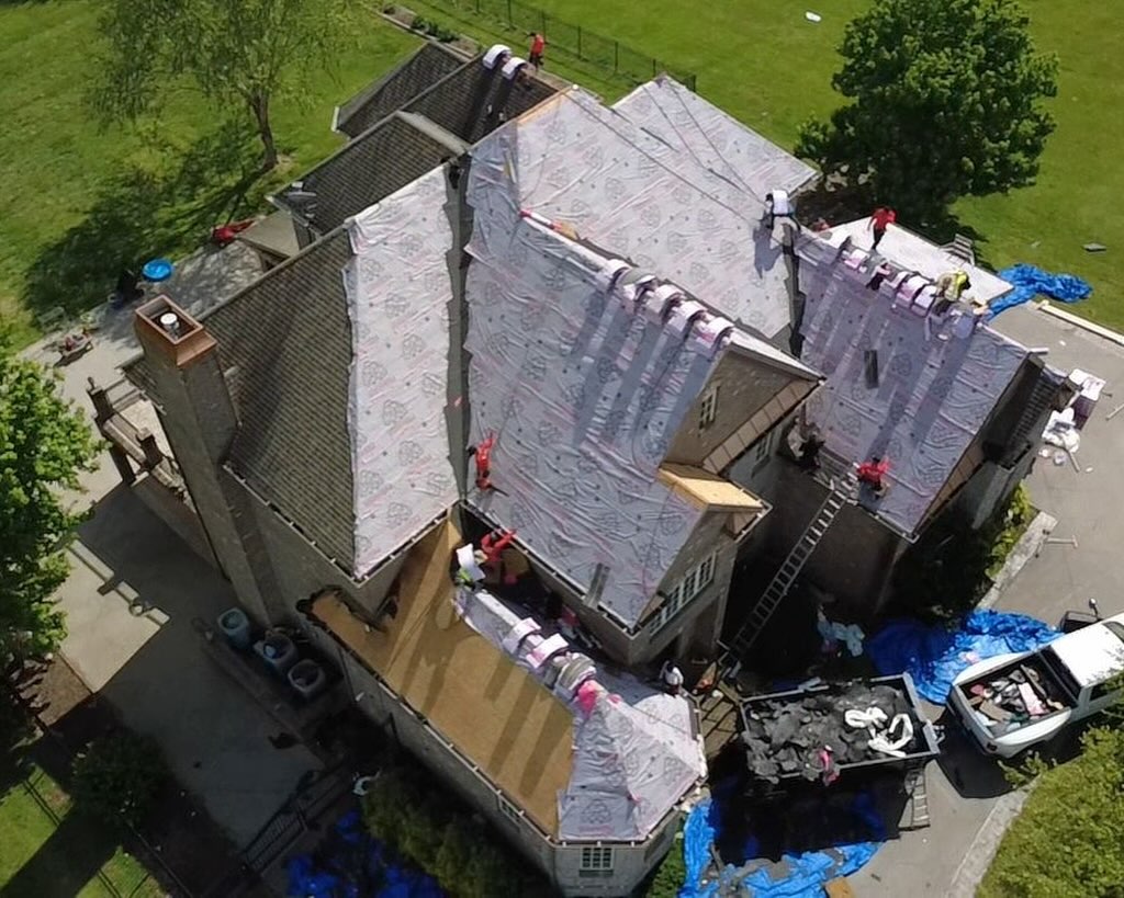 Trained crews. King Roofing supervision.
